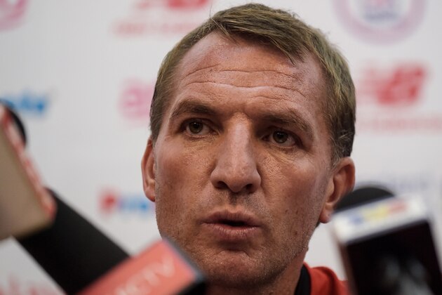 Liverpool's Northern Irish manager Brendan Rodgers answers questions during a press conference in Kuala Lumpur on July 22, 2015 ahead of their friendly match against Malaysia XI. Liverpool will play an exhibition match against a Malaysia XI team at the Bukit Jalil Stadium on July 24.  AFP PHOTO / MANAN VATSYAYANA        (Photo credit should read MANAN VATSYAYANA/AFP/Getty Images)