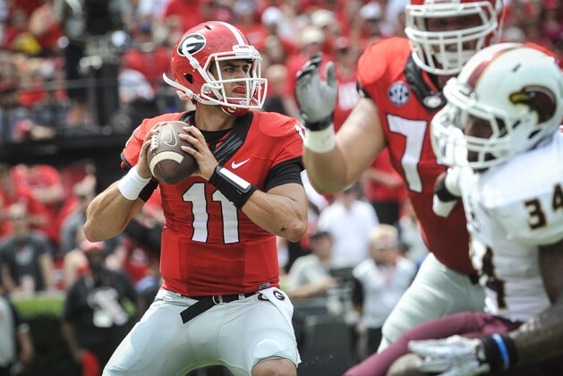 Georgia quarterback Greyson Lambert drops back to pass against Louisiana Monroe linebacker Michael Johnson (34) during the first half of an NCAA college football game, Saturday, Sept., 5, 2015, in Athens, Ga. (AP Photo/John Amis) Georgia quarterback Greyson Lambert drops back to pass against Louisiana Monroe linebacker Michael Johnson (34) during the first half of an NCAA college football game, Saturday, Sept., 5, 2015, in Athens, Ga. (AP Photo/John Amis)