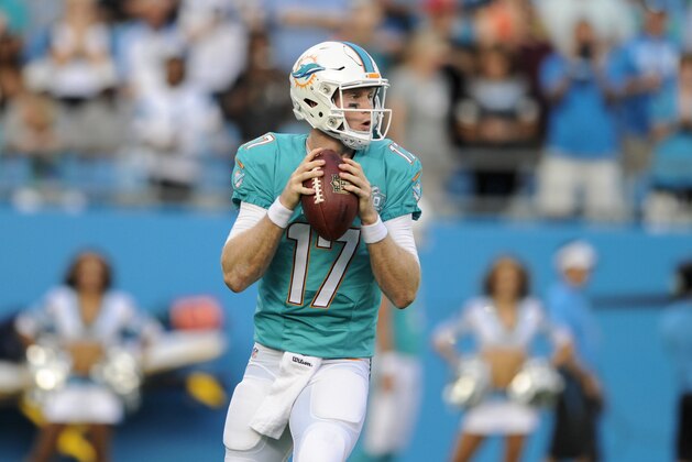 Miami Dolphins quarterback Ryan Tannehill (17) looks to pass during an NFL football game against the Carolina Panthers in Charlotte, NC, Saturday, Aug. 22, 2015. (AP Photo / Mike McCarn)