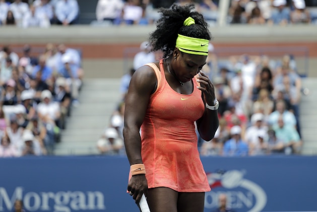 Serena Williams reacts after losing a point to Roberta Vinci, of Italy, during a semifinal match at the U.S. Open tennis tournament, Friday, Sept. 11, 2015, in New York. (AP Photo/Bill Kostroun)