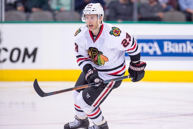 Mar 21, 2015; Dallas, TX, USA; Chicago Blackhawks right wing Kris Versteeg (23) skates against the Dallas Stars at the American Airlines Center. The Stars shut out the Blackhawks 4-0. Mandatory Credit: Jerome Miron-USA TODAY Sports