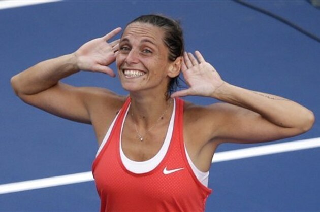 Roberta Vinci, of Italy, reacts to the crowd after beating Serena Williams during a semifinal match at the U.S. Open tennis tournament, Friday, Sept. 11, 2015, in New York. (AP Photo/Seth Wenig)