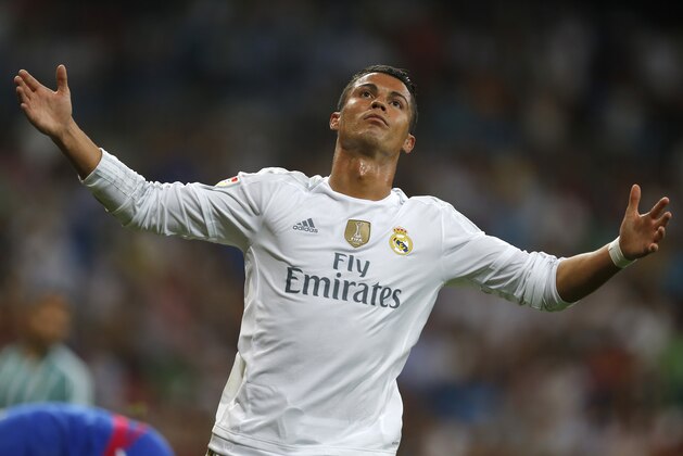 Real Madrid's Cristiano Ronaldo reacts after missing a chance during a Spanish La Liga soccer match between Real Madrid and Real Betis at the Santiago Bernabeu stadium in Madrid, Saturday, Aug. 29, 2015. Real Madrid won 5-0. (AP Photo/Francisco Seco)