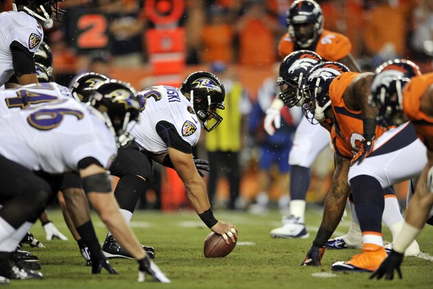 The Baltimore Ravens line up against the Denver Broncos during an NFL football game, Thursday, Sept. 5, 2013, in Denver. (AP Photo/Jack Dempsey)