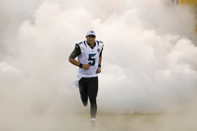 Jacksonville Jaguars quarterback Blake Bortles (5) takes the field before an NFL preseason football game between the Jacksonville Jaguars and the Detroit Lions in Jacksonville, Fla., Friday, Aug. 28, 2015.(AP Photo/Stephen B. Morton)