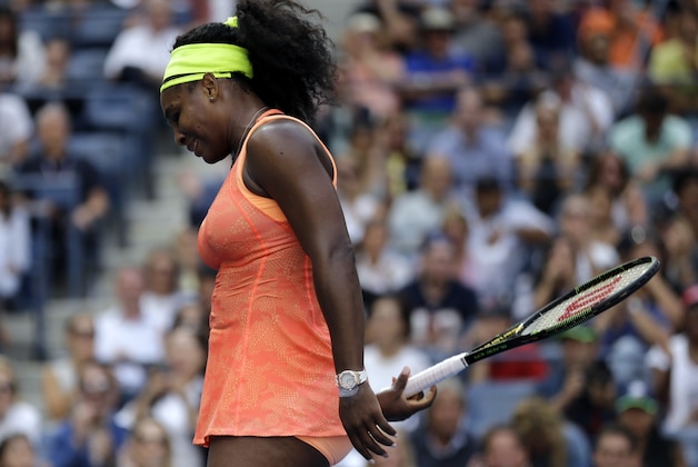 Serena Williams reacts after losing a point to Roberta Vinci, of Italy, during a semifinal match at the U.S. Open tennis tournament, Friday, Sept. 11, 2015, in New York. (AP Photo/David Goldman)