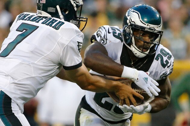 GREEN BAY, WI - AUGUST 29: Sam Bradford #7 of the Philadelphia Eagles hands the ball off to DeMarco Murray #29 during a preseason game at Lambeau Field on August 29, 2015 in Green Bay, Wisconsin.  (Photo by Jon Durr/Getty Images)