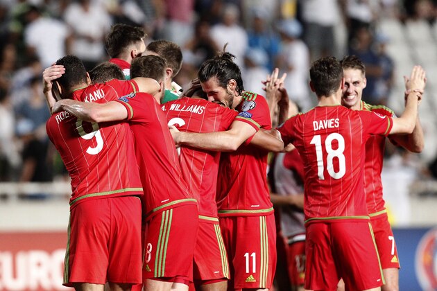 Wales players celebrate their win against Cyprus during the Euro 2016 qualifying Group B match between Cyprus and Wales, at GSP stadium, in Nicosia, Cyprus, Thursday, Sept. 3, 2015. Wales beat Cyprus 1-0. (AP Photo/Petros Karadjias) Wales players celebrate their win against Cyprus during the Euro 2016 qualifying Group B match between Cyprus and Wales, at GSP stadium, in Nicosia, Cyprus, Thursday, Sept. 3, 2015. Wales beat Cyprus 1-0. (AP Photo/Petros Karadjias)
