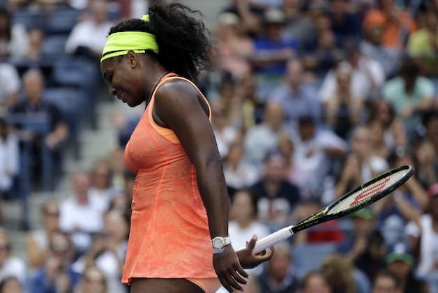 Serena Williams reacts after losing a point to Roberta Vinci, of Italy, during a semifinal match at the U.S. Open tennis tournament, Friday, Sept. 11, 2015, in New York. (AP Photo/David Goldman)