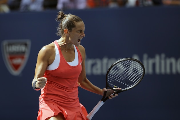 Roberta Vinci, of Italy, reacts after winning a point against Serena Williams during a semifinal match at the U.S. Open tennis tournament, Friday, Sept. 11, 2015, in New York. (AP Photo/David Goldman)