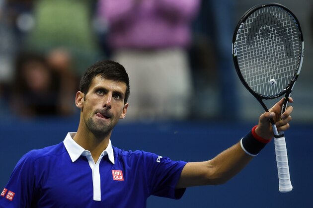 Novak Djokovic of Serbia celebrates after defeating Marin Cilic of Croatia during their 2015 US Open Men's singles semifinals match at the USTA Billie Jean King National Tennis Center in New York on September 11, 2015. Djokovic won 6-0, 6-1, 6-2. AFP PHOTO/JEWEL SAMAD        (Photo credit should read JEWEL SAMAD/AFP/Getty Images)