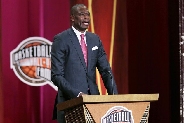 Basketball Hall of Fame inductee Dikembe Mutombo speaks during the enshrinement ceremony for the Class of 2015 of the Naismith Memorial Basketball Hall of Fame in Springfield, Mass., Friday, Sept. 11, 2015. (AP Photo/Charles Krupa)