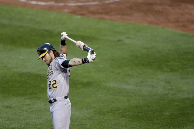 Oakland Athletics' Josh Reddick prepares for an at-bat during a baseball game against the Baltimore Orioles, Monday, Aug. 17, 2015, in Baltimore. (AP Photo/Patrick Semansky)