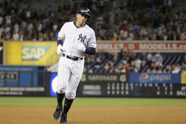 New York Yankees' Alex Rodriguez runs the bases after hitting a home run during the sixth inning of a baseball game against the Baltimore Orioles on Tuesday, Sept. 8, 2015, in New York. (AP Photo/Frank Franklin II)