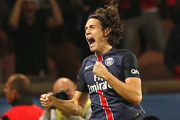 PSG's Edinson Cavani celebrates his goal during the French league one soccer match between Paris Saint Germain and Bordeaux, in Paris, France, Friday Sept. 11, 2015. (AP Photo/Christophe Ena)
