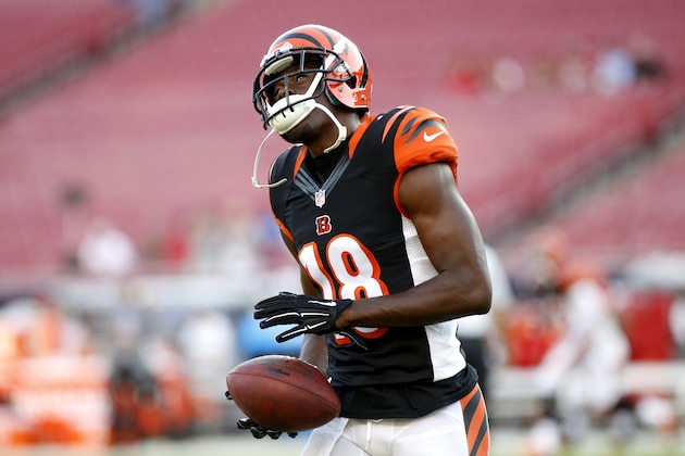 Cincinnati Bengals wide receiver A.J. Green (18) warms up before the start of an NFL preseason football game against the Tampa Bay Buccaneers Monday, Aug. 24, 2015, in Tampa, Fla. (AP Photo/Brian Blanco)
