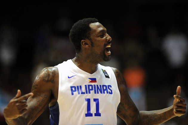 Philippines' centre Andray Blatche gestures during the 2014 FIBA World basketball championships group B match Philippines vs Puerto Rico at the Palacio Municipal de Deportes in Sevilla on September 3, 2014. AFP PHOTO/ CRISTINA QUICLER        (Photo credit should read CRISTINA QUICLER/AFP/Getty Images)