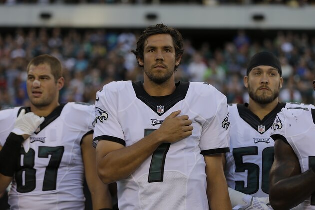 Philadelphia Eagles' Sam Bradford listens to the national anthem before a preseason NFL football game against the Baltimore Ravens, Saturday, Aug. 22, 2015, in Philadelphia. (AP Photo/Matt Rourke)