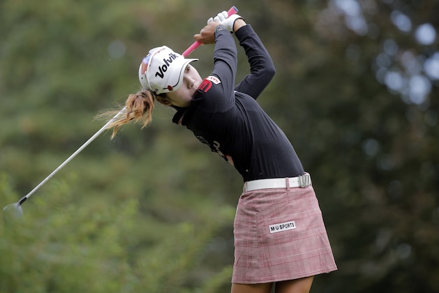 Mi Hyang Lee, of South Korea, plays a shot on the fourth hole during the third round of the Evian Championship women's golf tournament in Evian, eastern France, Saturday, Sept. 12, 2015. (AP Photo/Laurent Cipriani)