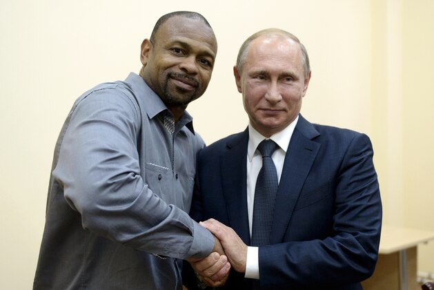 FILE - In this Wednesday, Aug. 19, 2015 file photo, Russian President Vladimir Putin meets with American boxer Roy Jones Jr. in Sevastopol, Crimea. Vladimir Putin has given Russian citizenship to former world heavyweight boxing champion Roy Jones Jr. A decree published on the Kremlin's website in the Russian president's name Saturday, Sept. 12, 2015 said the American, a four-weight champion once regarded by many as the world's best boxer, had been given Russian nationality. Jones asked Putin for citizenship in August over a cup of tea when they met in Crimea — the territory annexed by Russia last year — saying it would make doing business in Russia much easier. (Alexei Nikolsky/RIA-Novosti, Kremlin Pool Photo via AP, file)