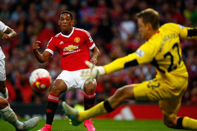 MANCHESTER, ENGLAND - SEPTEMBER 12:  Anthony Martial of Manchester United scores past Simon Mignolet of Liverpool for his team's third goal during the Barclays Premier League match between Manchester United and Liverpool at Old Trafford on September 12, 2015 in Manchester, United Kingdom.  (Photo by Shaun Botterill/Getty Images)