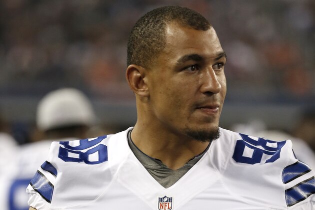 Dallas Cowboys defensive end Tyrone Crawford stands on the sidelines during the first half of a NFL preseason football game against the Denver Broncos, Thursday, Aug. 28. 2014, in Arlington, Texas. (AP Photo/Brandon Wade)