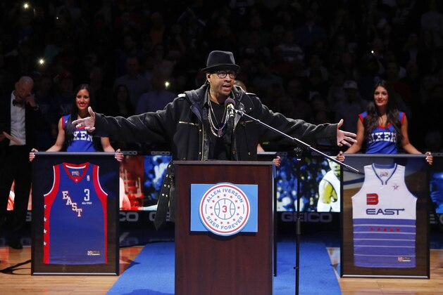 Former Philadelphia 76er Allen Iverson speaks to the crowd during a retirement ceremony at halftime of an NBA basketball game between the 76ers and the Washington Wizards, Saturday, March 1, 2014, in Philadelphia. (AP Photo/Matt Slocum)