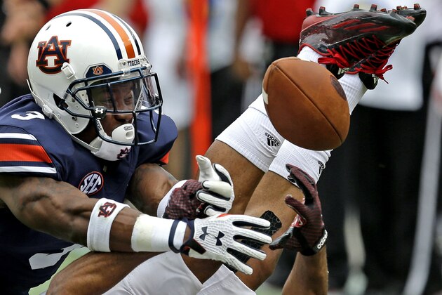 Auburn defensive back Jonathan Jones (3) breaks up a pass intended for Jacksonville State wide receiver Ruben Gonzalez (15) during the second half of an NCAA college football game, Saturday, Sept. 12, 2015, in Auburn, Ala. (AP Photo/Butch Dill)