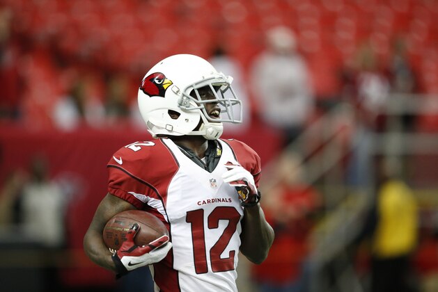 Arizona Cardinals wide receiver John Brown (12) warms up before the first half of an NFL football game against the Atlanta Falcons, Sunday, Nov. 30, 2014, in Atlanta. (AP Photo/Brynn Anderson )
