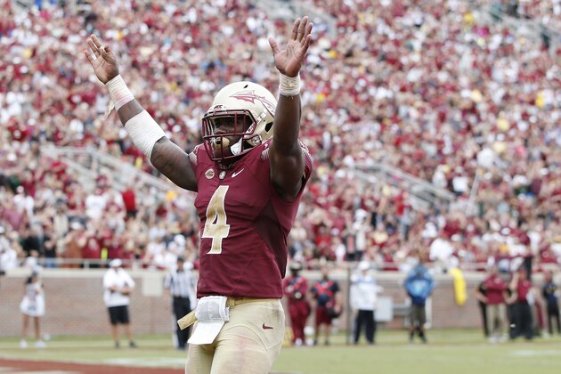 TALLAHASSEE, FL - SEPTEMBER 12: Dalvin Cook #4 of the Florida State Seminoles celebrates against the South Florida Bulls during a game at Doak Campbell Stadium on September 12, 2015 in Tallahassee, Florida. Florida State defeated South Florida 34-14. (Photo by Joe Robbins/Getty Images)