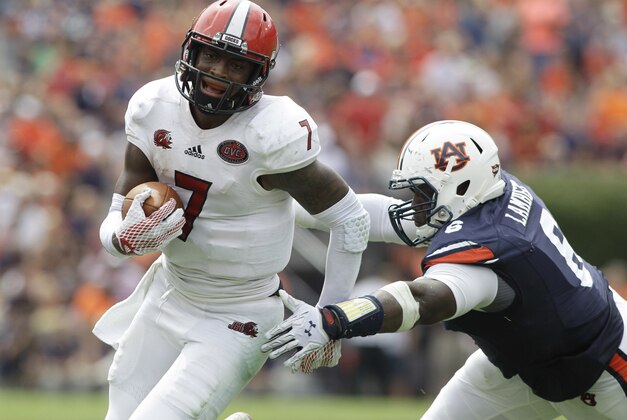 Sep 12, 2015; Auburn, AL, USA; Jacksonville State Gamecocks quarterback Eli Jenkins (7) gets past linebacker DaVonte Lambert (6) during the fourth quarter at Jordan Hare Stadium.  The Tigers beat the Gamecocks 27-20. Mandatory Credit: John Reed-USA TODAY Sports