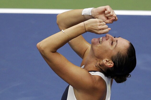 Flavia Pennetta, of Italy, reacts after beating Roberta Vinci, of Italy, during the women's championship match of the U.S. Open tennis tournament, Saturday, Sept. 12, 2015, in New York. (AP Photo/Seth Wenig)