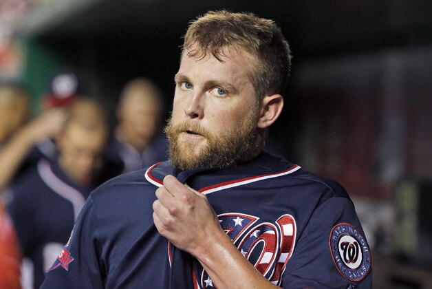 Washington Nationals relief pitcher Drew Storen (22) walks in the dugout during the eighth inning a baseball game at Nationals Park, Wednesday, Sept. 9, 2015, in Washington.  The Mets won 5-3. (AP Photo/Alex Brandon)