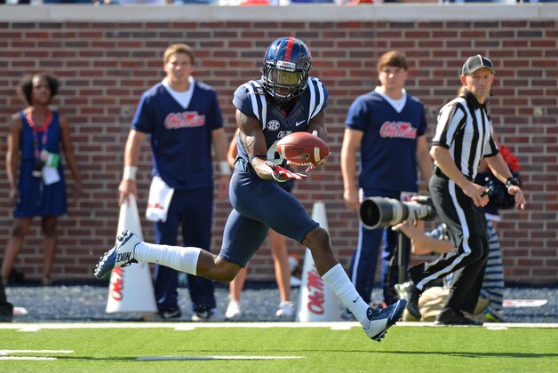 Mississippi wide receiver Quincy Adeboyejo (8) catches a 44-yard touchdown pass during the first half of an NCAA college football game against Fresno State in Oxford, Miss., Saturday, Sept. 12, 2015. (AP Photo/Thomas Graning)