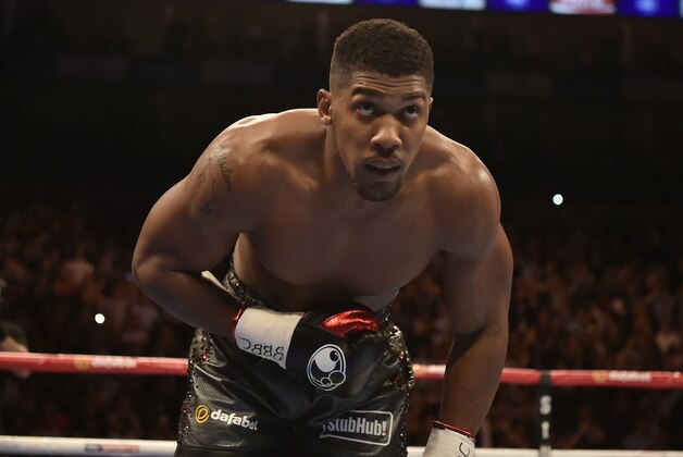 LONDON, ENGLAND - SEPTEMBER 12:  Anthony Joshua acknowledges the crowd after defeating Gary Cornish for the WBC International Heavyweight title & vacant Commonwealth Heavyweight title during 'Heavy Duty' fight night at The O2 Arena on September 12, 2015 in London, England.  (Photo by Leigh Dawney/Getty Images)