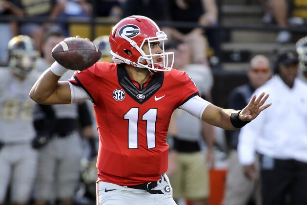 Georgia quarterback Greyson Lambert passes against Vanderbilt in the second half of an NCAA college football game Saturday, Sept. 12, 2015, in Nashville, Tenn. Georgia won 31-14. (AP Photo/Mark Humphrey)
