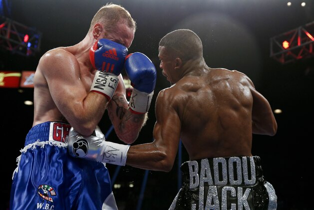 Badou Jack hits George Groves during their super middleweight title fight Saturday, Sept. 12, 2015, in Las Vegas. (AP Photo/John Locher)