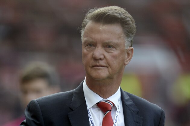 Manchester United's Dutch manager Louis van Gaal arrives for the English Premier League football match between Manchester United and Liverpool at Old Trafford in Manchester, north west England, on September 12, 2015. AFP PHOTO / OLI SCARFF

RESTRICTED TO EDITORIAL USE. No use with unauthorized audio, video, data, fixture lists, club/league logos or 'live' services. Online in-match use limited to 75 images, no video emulation. No use in betting, games or single club/league/player publications.        (Photo credit should read OLI SCARFF/AFP/Getty Images)