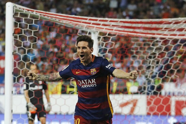 Barcelona’s Lionel Messi celebrates after scoring during a Spanish La Liga soccer match between Atletico Madrid and Barcelona at the Vicente Calderon stadium in Madrid, Spain, Saturday Sept. 12, 2015. (AP Photo/Paul White)