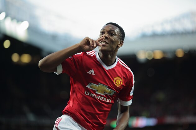 MANCHESTER, ENGLAND - SEPTEMBER 12:  Anthony Martial of Manchester United celebrates after scoring a goal to make it 3-1 on his debut during the Barclays Premier League match between Manchester United and Liverpool on September 12, 2015 in Manchester, United Kingdom.  (Photo by Matthew Ashton - AMA/Getty Images)