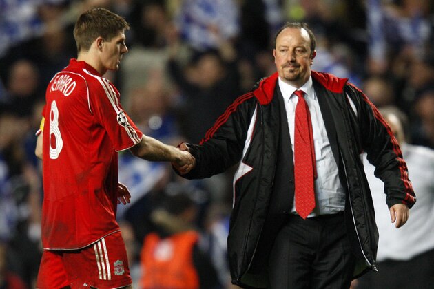 Liverpool manager Rafa Benitez (R) shakes hands with player Steven Gerrard after they lost to Chelsea during a UEFA Champions League semi-final game at Stamford Bridge in London, on April 30, 2008. AFP PHOTO/ADRIAN DENNIS (Photo credit should read ADRIAN DENNIS/AFP/Getty Images)