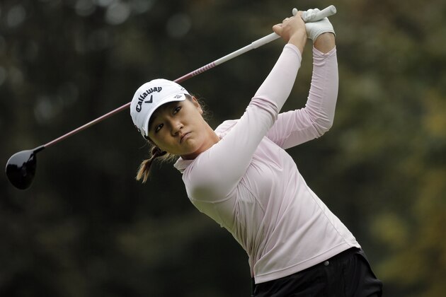 Lydia Ko, of New Zealand, follows her ball after playing on the 4th hole during the last round of the Evian Championship women's golf tournament in Evian, eastern France, Sunday, Sept. 13, 2015. (AP Photo/Laurent Cipriani)