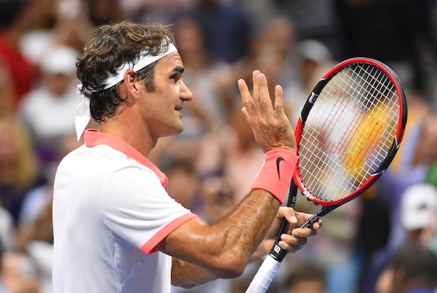 Sep 11, 2015; New York, NY, USA; Roger Federer of Switzerland celebrates after beating  Stan Wawrinka of Switzerland on day twelve of the 2015 U.S. Open tennis tournament at USTA Billie Jean King National Tennis Center. Mandatory Credit: Robert Deutsch-USA TODAY Sports