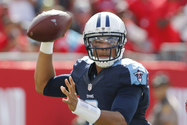 Tennessee Titans quarterback Marcus Mariota (8) looks to pass during the first half of an NFL football game against the Tampa Bay Buccaneers, Sunday, Sept. 13, 2015, in Tampa, Fla. (AP Photo/Scott Audette)