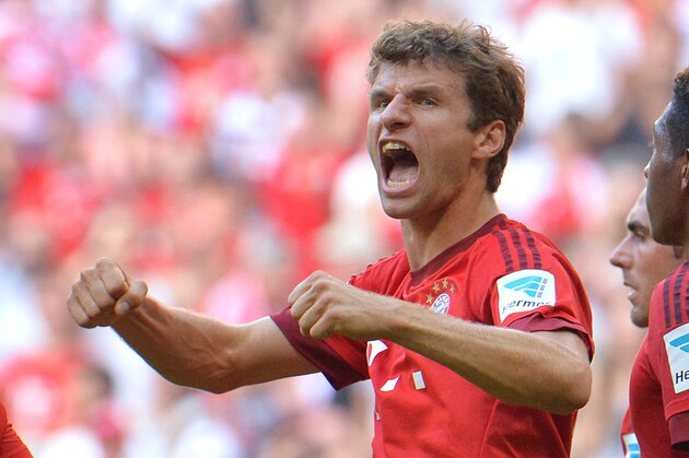 Bayern's Thomas Mueller celebrates after scoring during the German Bundesliga soccer match between FC Bayern Munich and FC Augsburg in the Allianz Arena in Munich, Germany, on Saturday, Sept. 12, 2015. (AP Photo/Kerstin Joensson)