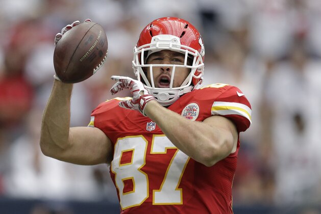 Kansas City Chiefs' Travis Kelce (87) celebrates his touchdown catch against the Houston Texans during the first half of an NFL football game Sunday, Sept. 13, 2015, in Houston. (AP Photo/Patric Schneider)
