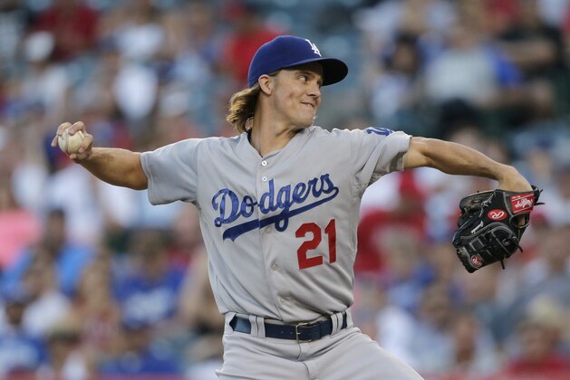 Los Angeles Dodgers starting pitcher Zack Greinke throws against the Los Angeles Angels during the first inning of a baseball game, Monday, Sept. 7, 2015, in Anaheim, Calif. (AP Photo/Jae C. Hong)