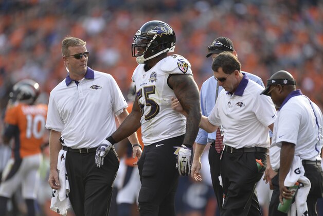 Sep 13, 2015; Denver, CO, USA; Baltimore Ravens outside linebacker Terrell Suggs (55) leaves the field due to injury  in the fourth quarter against the Denver Broncos at Sports Authority Field at Mile High. The Broncos won 19-13. Mandatory Credit: Ron Chenoy-USA TODAY Sports