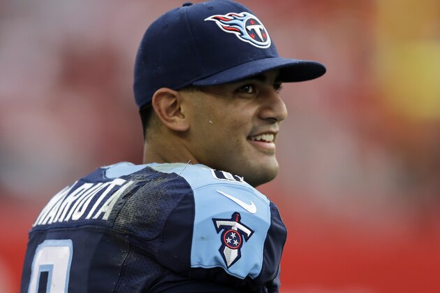 Tennessee Titans quarterback Marcus Mariota smiles during the fourth quarter of an NFL football game against the Tampa Bay Buccaneers Sunday, Sept. 13, 2015, in Tampa, Fla. (AP Photo/Chris O'Meara)