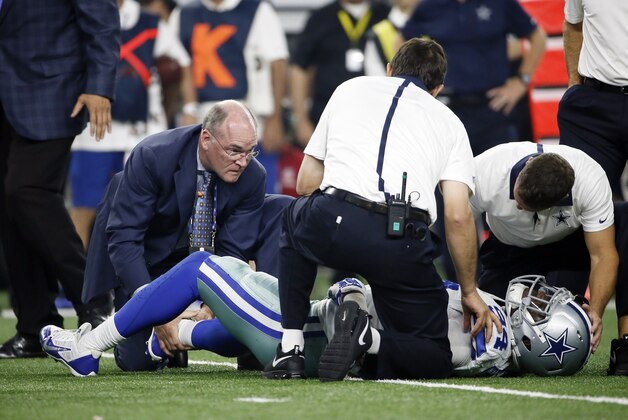 Dallas Cowboys defensive end Randy Gregory (94) is helped ager being injured during the second half of an NFL football game against the New York Giants Sunday, Sept. 13, 2015, in Arlington, Texas. (AP Photo/Tony Gutierrez)